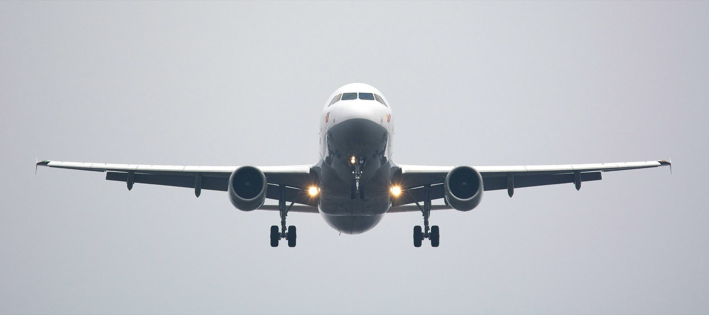 Aeroplane on an airport runway at dusk